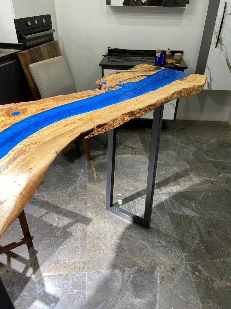 Long live edge wood console table with blue epoxy resin and black metal legs